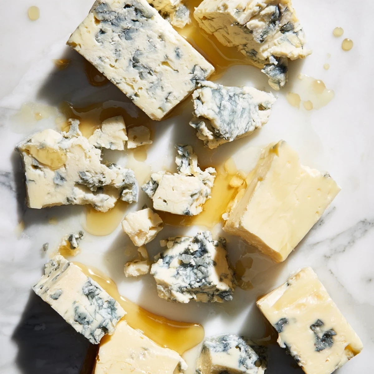 Marble Quarry cheese board showcasing blue cheese and cheddar, a stunning appetizer ready to serve.