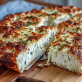 High-protein cottage cheese flatbreads baked to a light golden hue, perfect as a gluten-free bread alternative.  