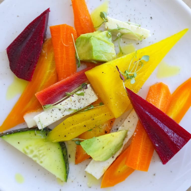 Vibrant Cubist Deconstruction on a platter: visually stunning modern appetizer with feta and fresh ingredients.