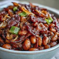 Juneteenth BBQ Baked Beans with Bacon, a smoky-sweet, comforting side dish.